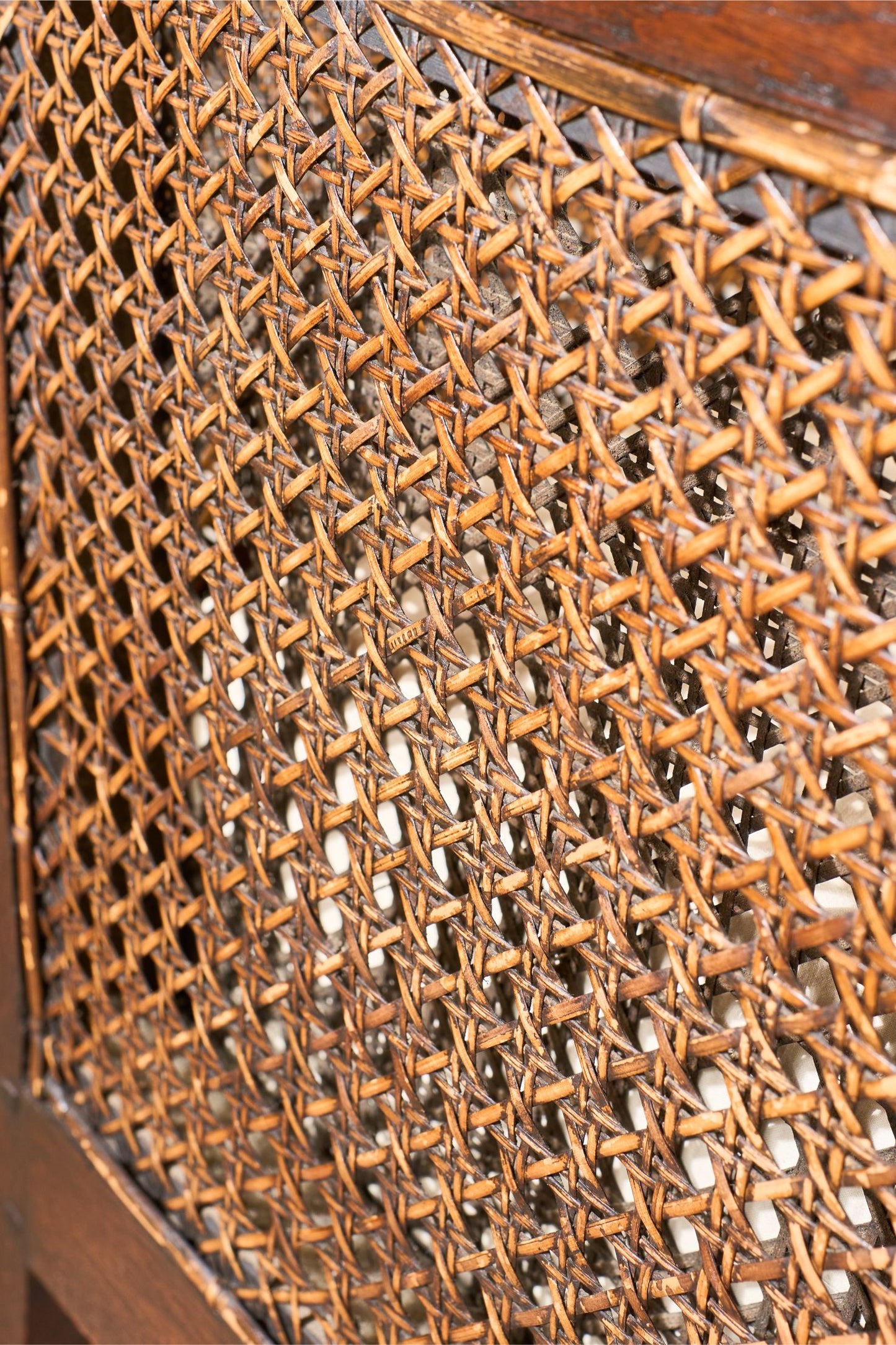 Pair of c.1920 barley twist mahogany rattan lounge chairs