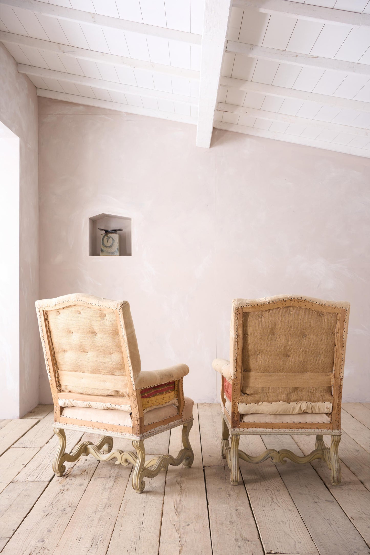 Pair of 19th century French buttoned back armchairs with painted carved frame