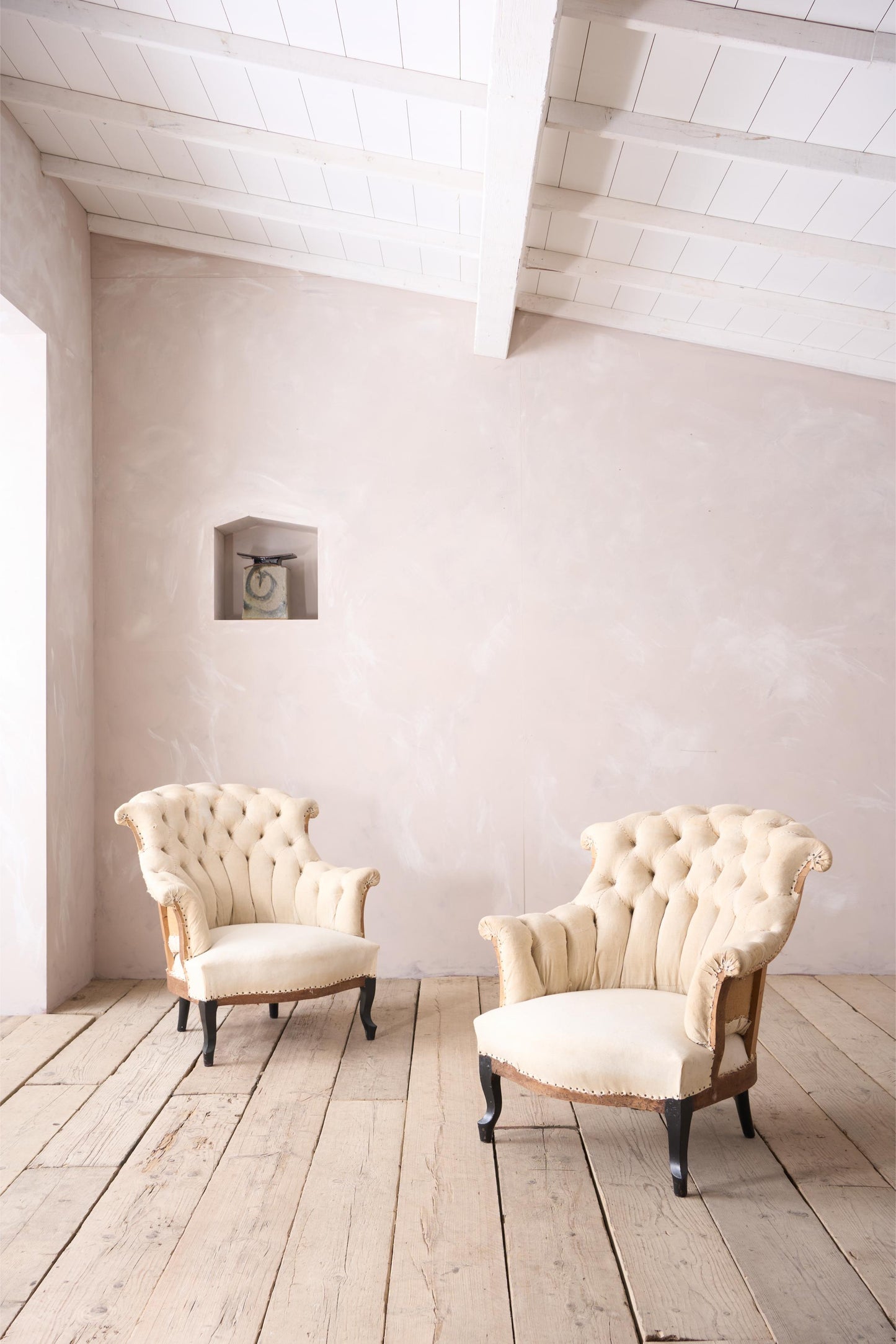 Pair of Napoleon III buttoned fishtail armchairs