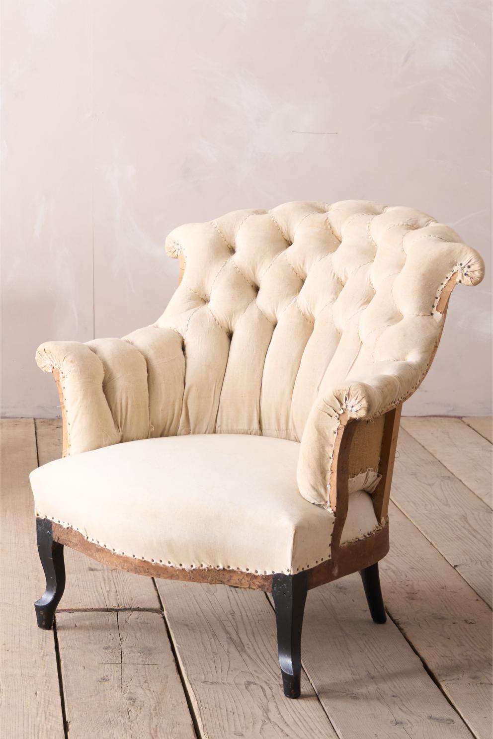 Pair of Napoleon III buttoned fishtail armchairs