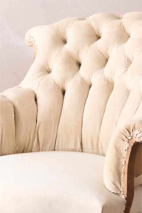 Pair of Napoleon III buttoned fishtail armchairs