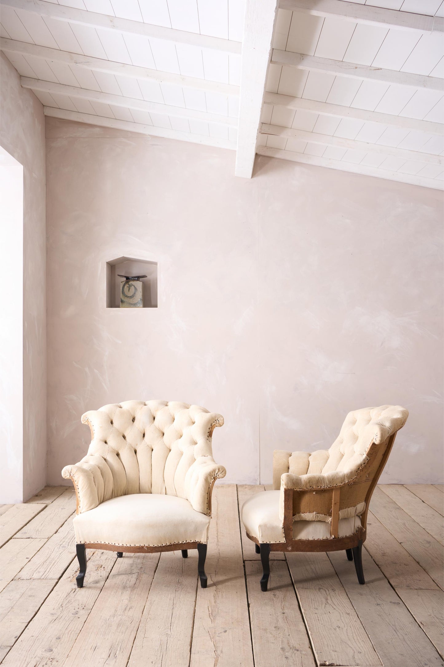 Pair of Napoleon III buttoned fishtail armchairs