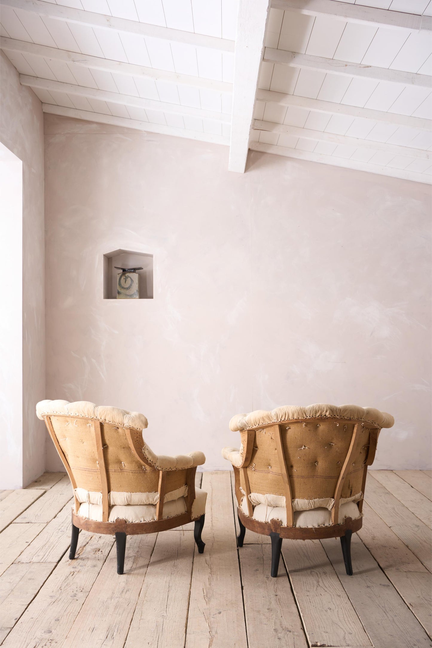 Pair of Napoleon III buttoned fishtail armchairs