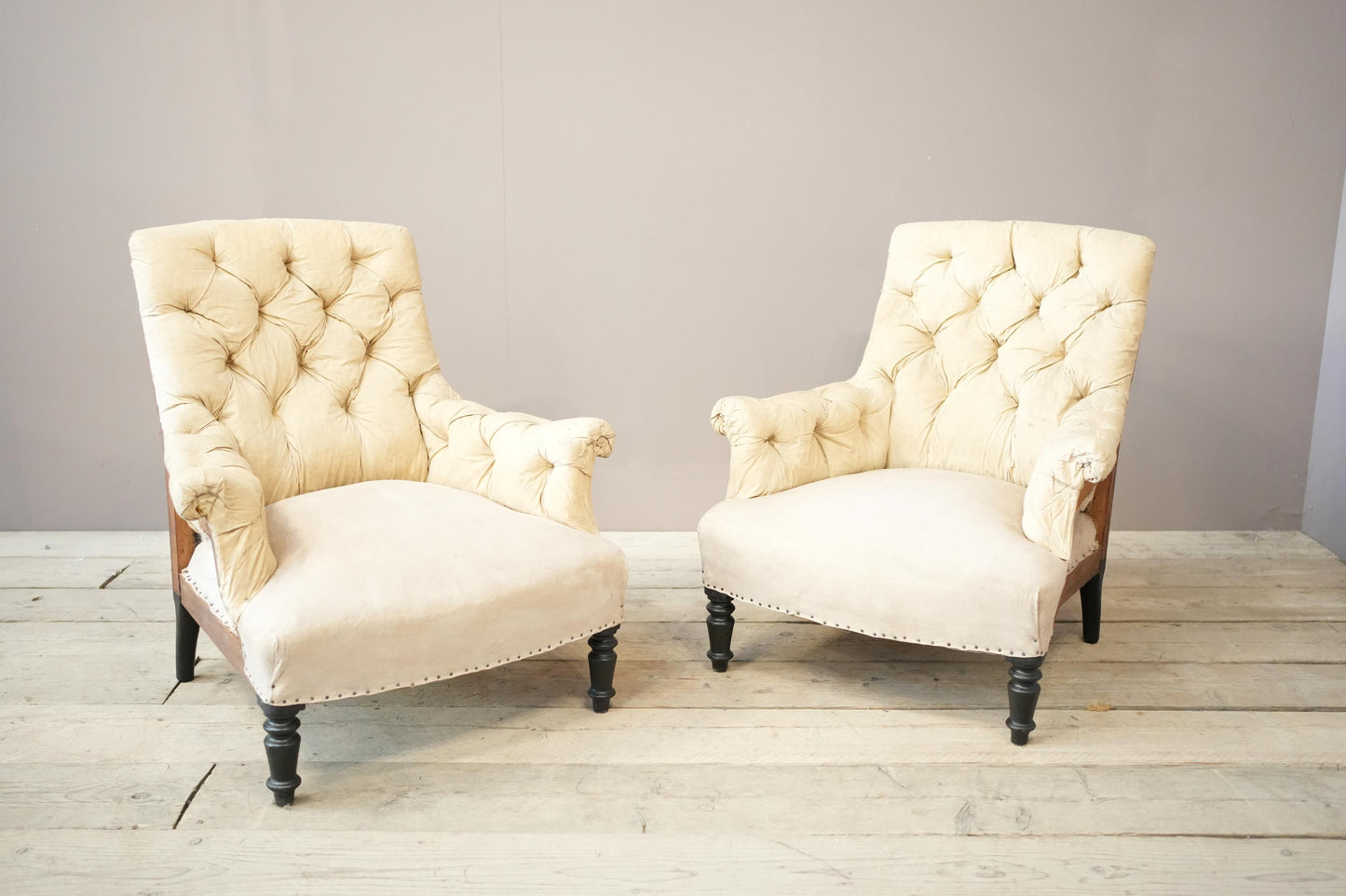 Pair of Napoleon III buttoned square back armchairs