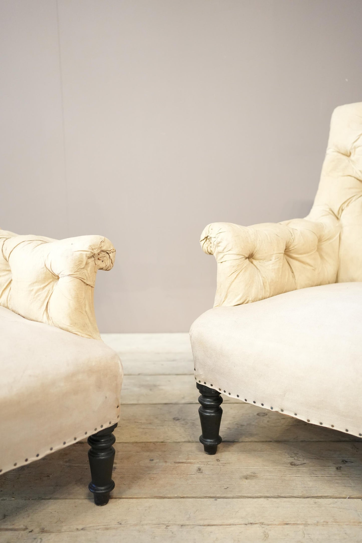 Pair of Napoleon III buttoned square back armchairs