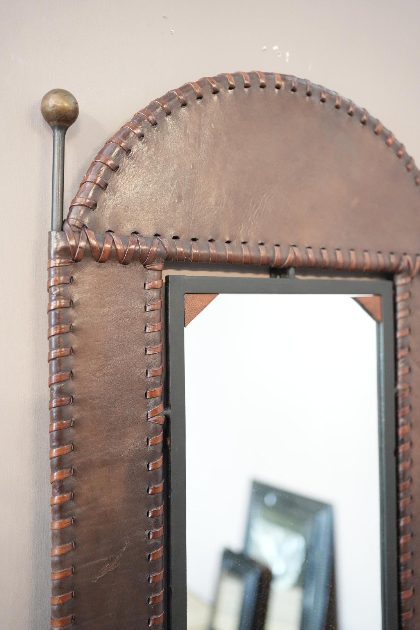 20th century Leather and iron wall mirror