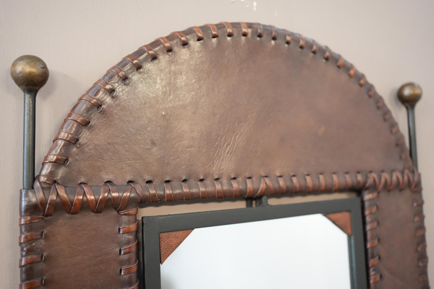 20th century Leather and iron wall mirror