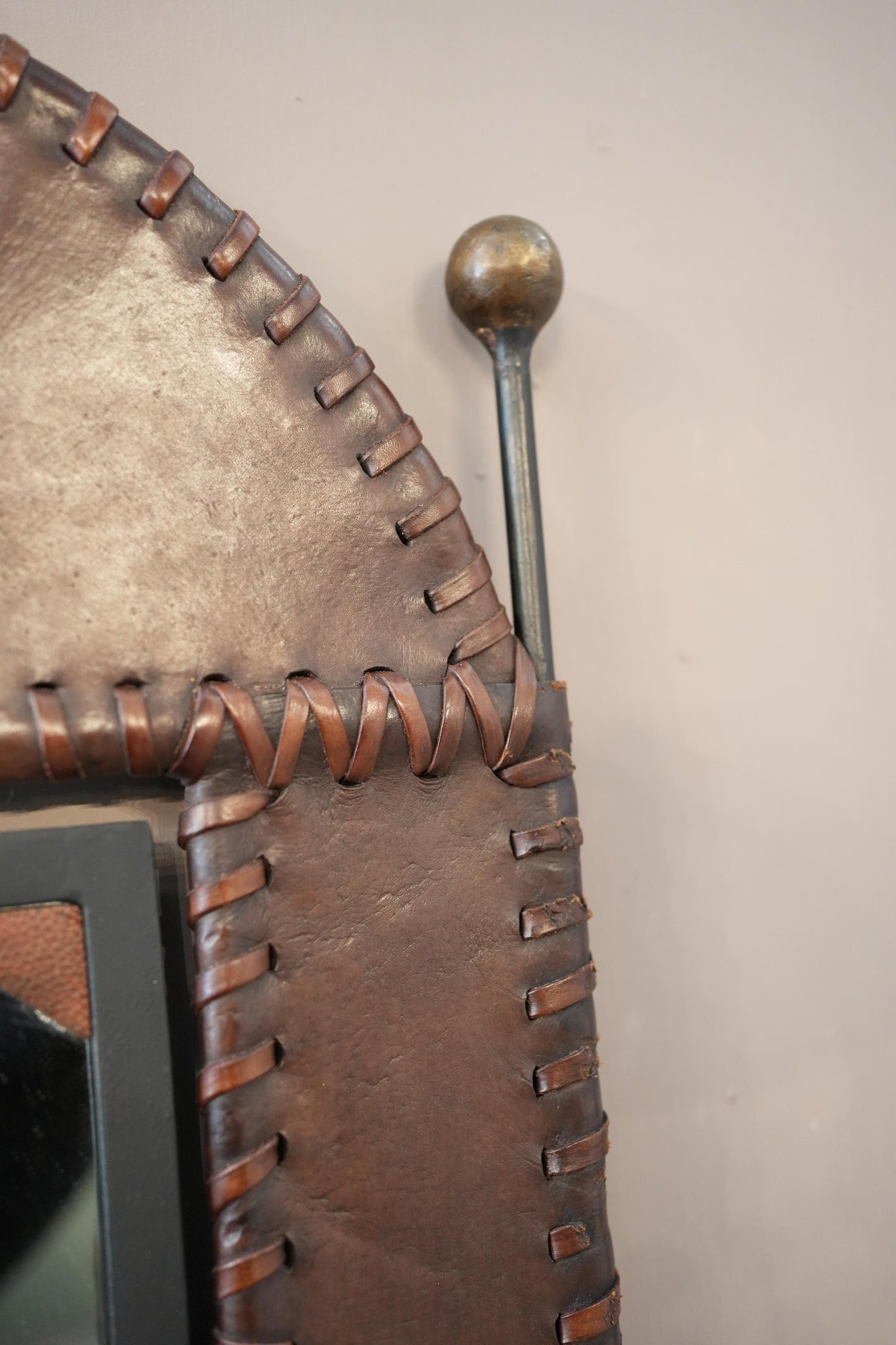20th century Leather and iron wall mirror