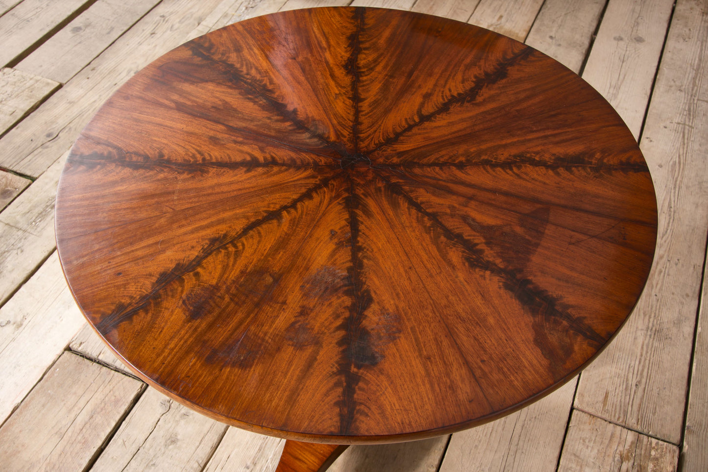 19th century Flame mahogany tilt top table