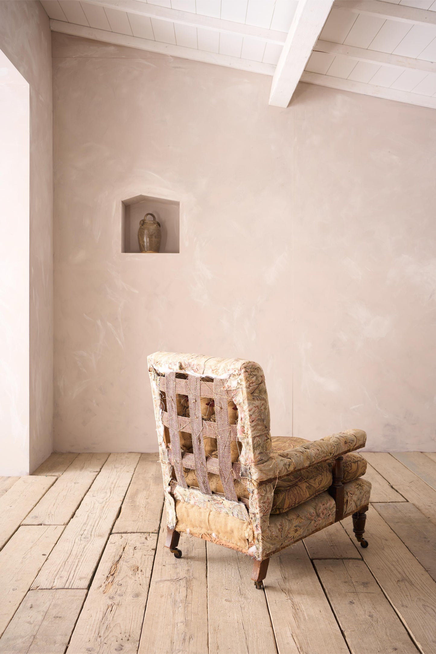 19th century buttoned square back open armchair