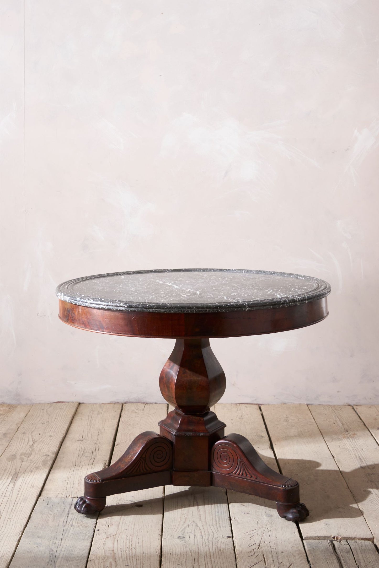 Early 19th century Mahogany and black marble Gueridon table