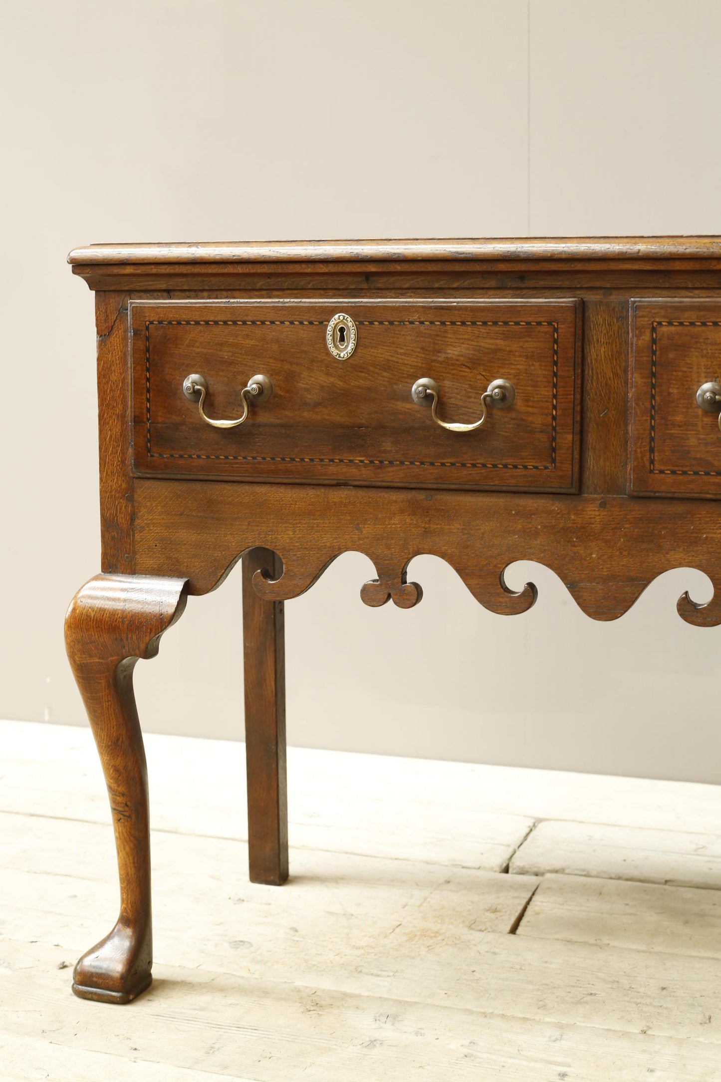 18th century Georgian lowboy with fret work boarder