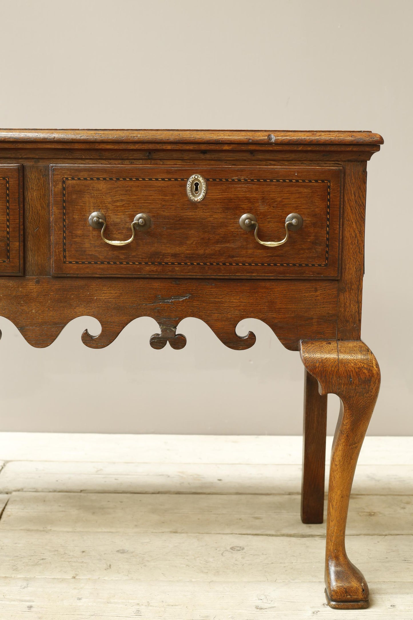 18th century Georgian lowboy with fret work boarder
