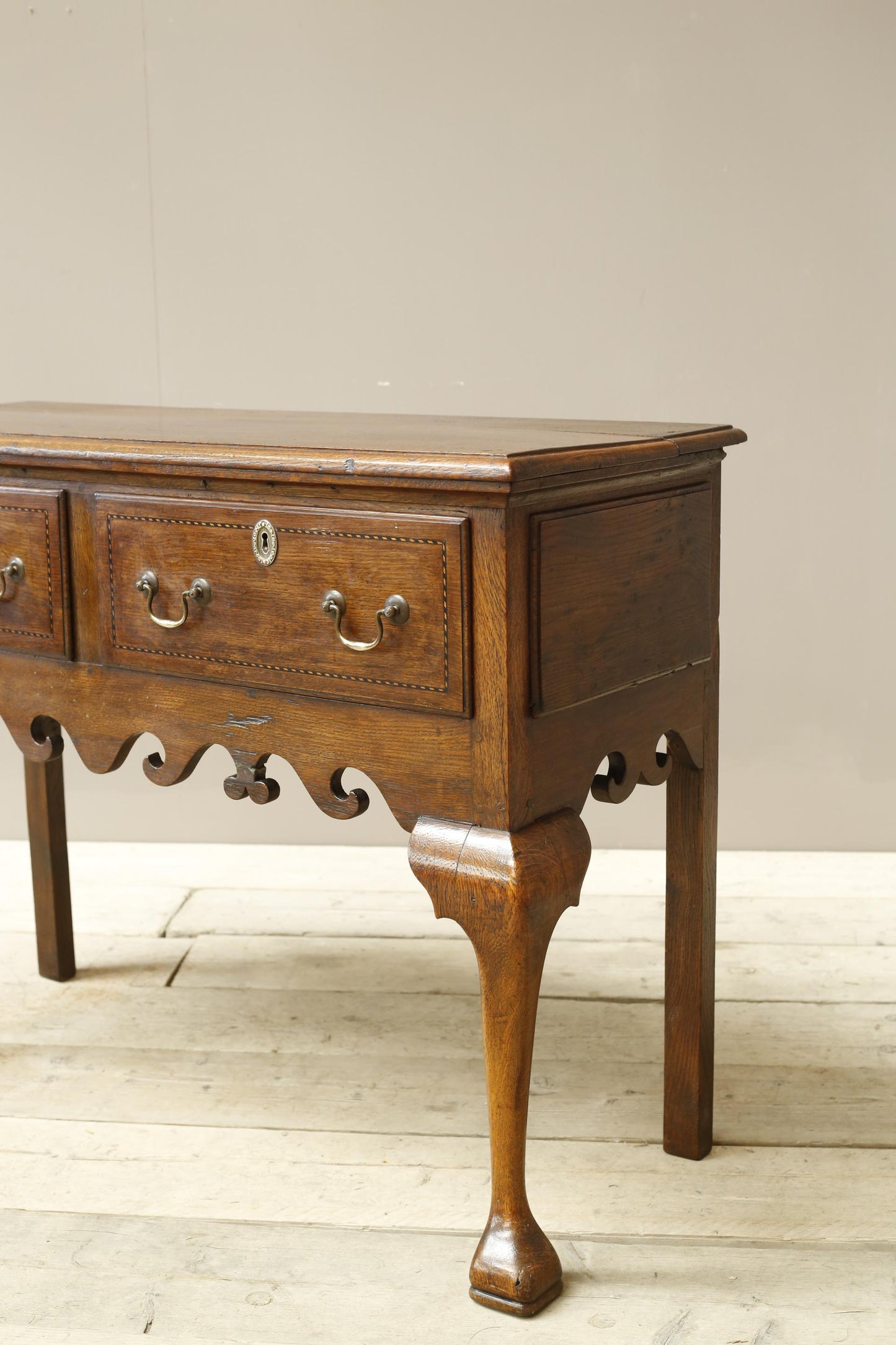 18th century Georgian lowboy with fret work boarder
