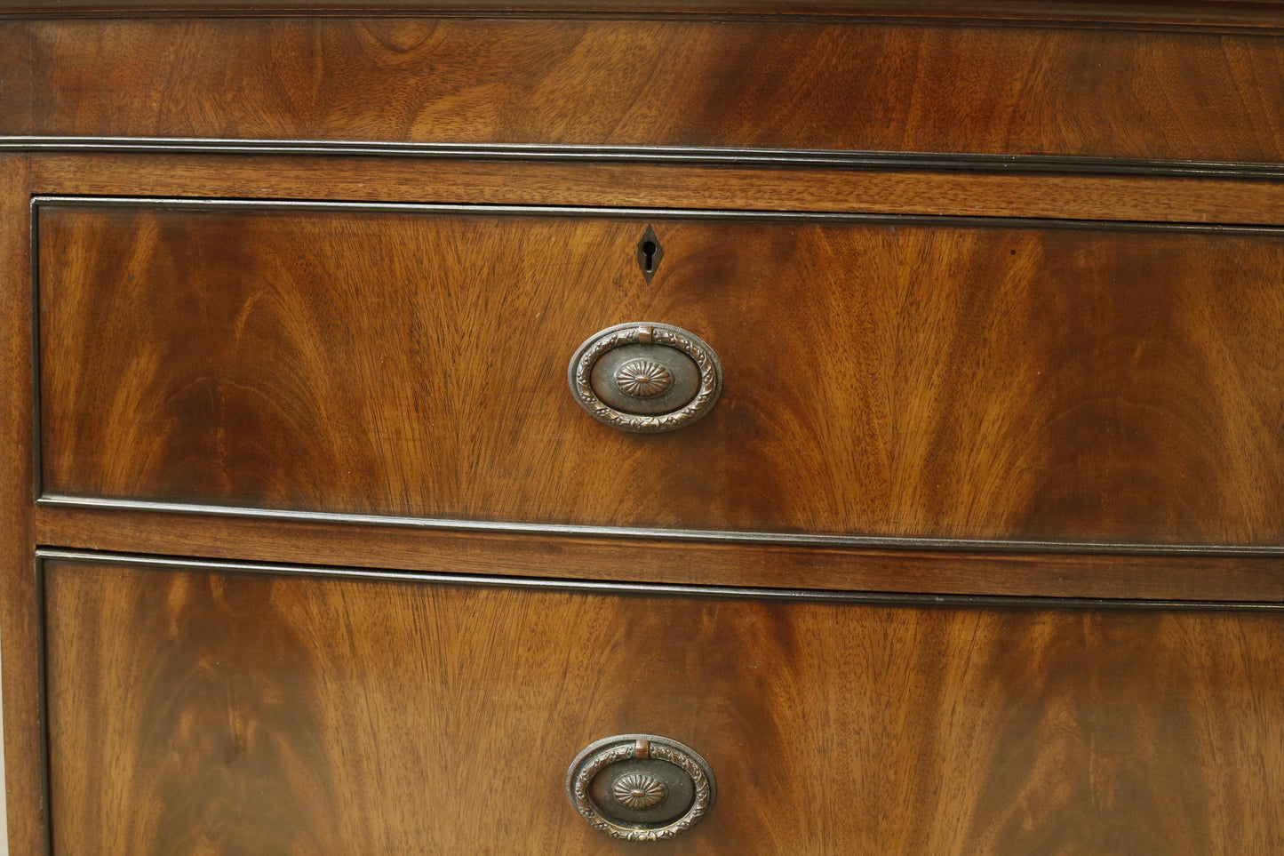 Edwardian flame mahogany chest of drawers by Marsh, Jones & Cribb