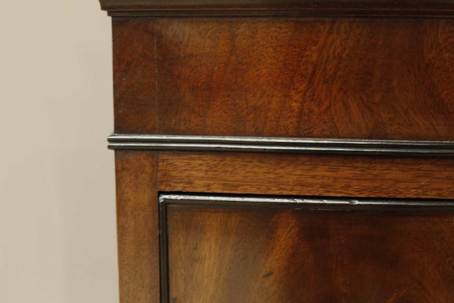 Edwardian flame mahogany chest of drawers by Marsh, Jones & Cribb