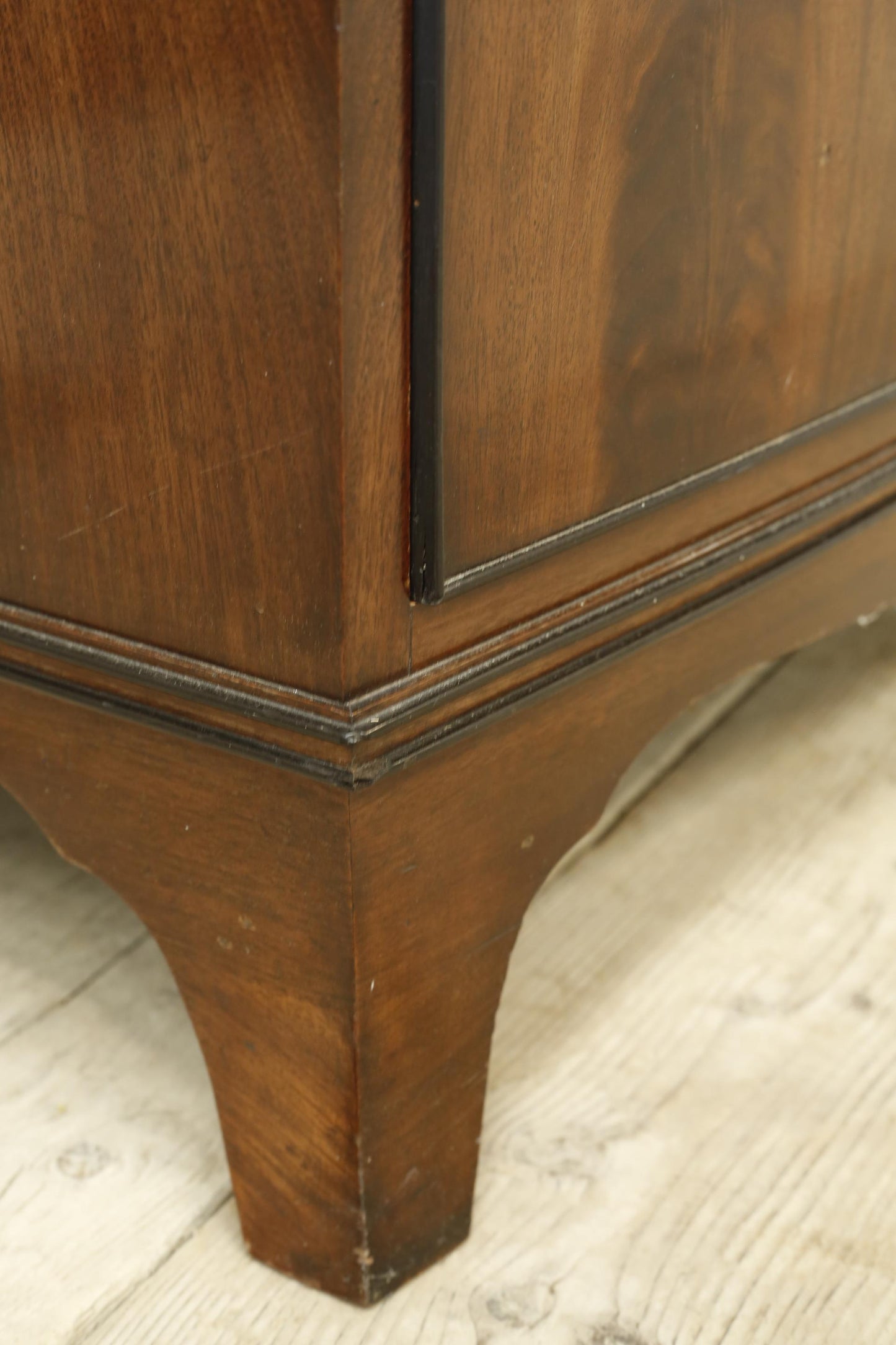 Edwardian flame mahogany chest of drawers by Marsh, Jones & Cribb