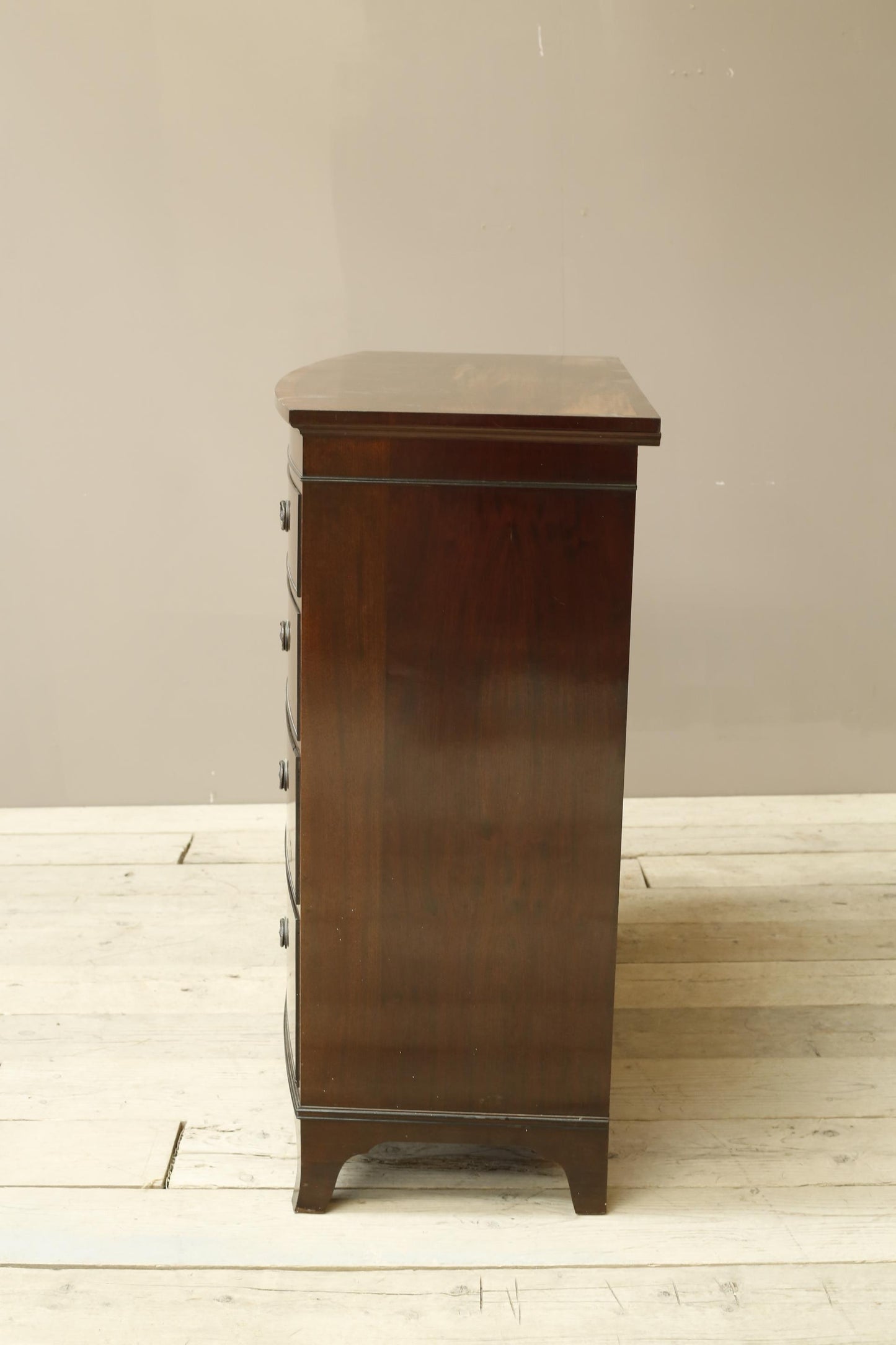 Edwardian flame mahogany chest of drawers by Marsh, Jones & Cribb