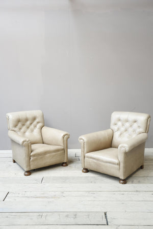 Pair of 1920's English deep seated armchairs