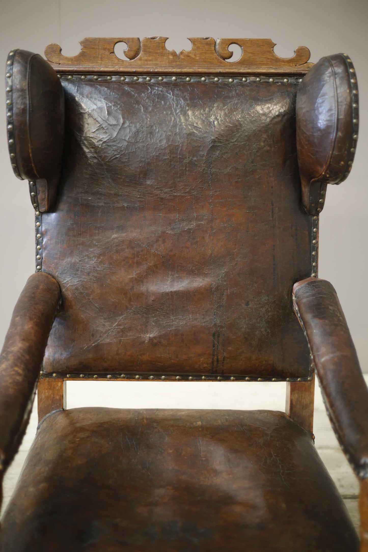 18th century Elm and Leather wingback armchair