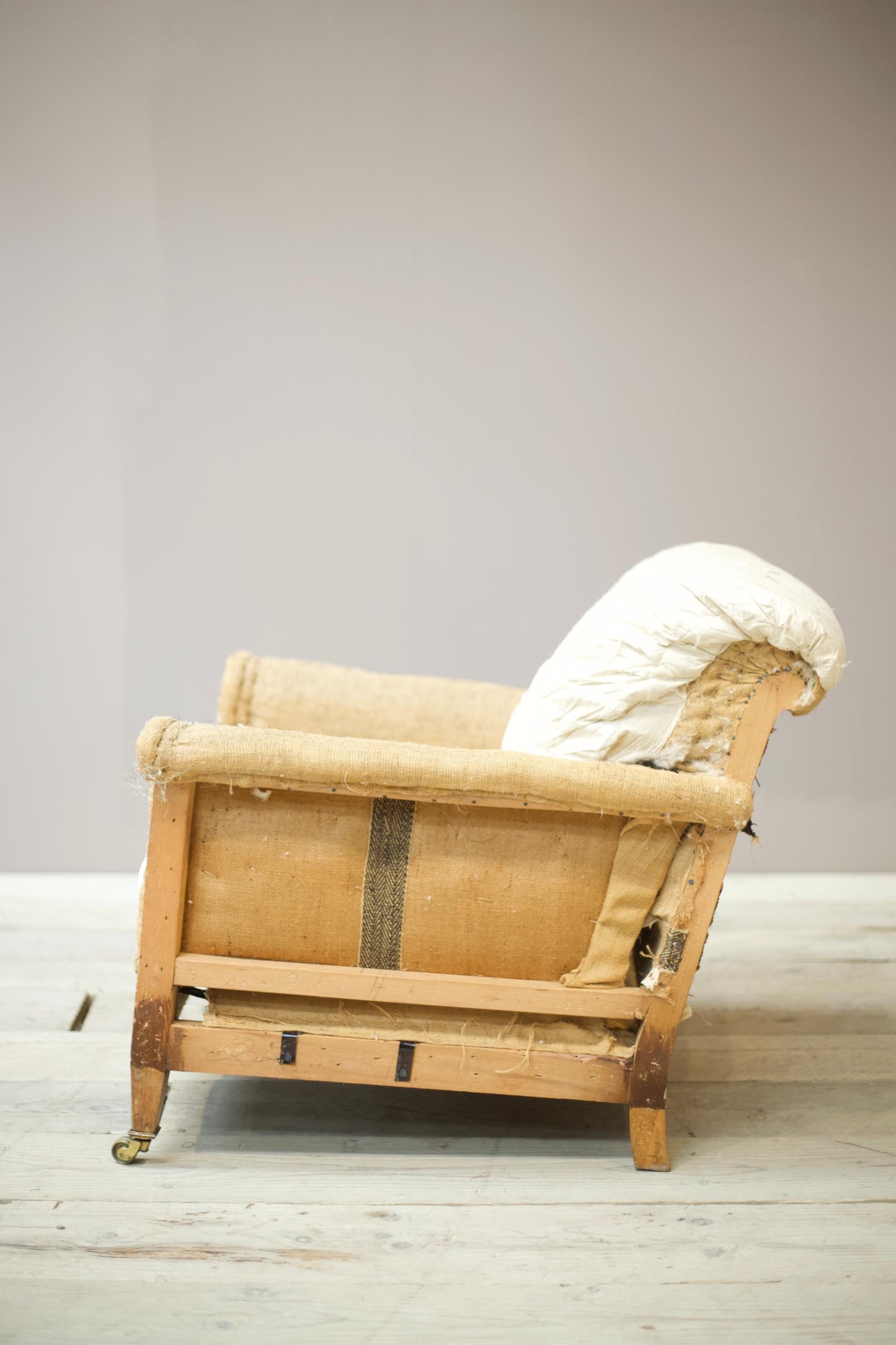 Howard and sons style Edwardian cushioned back armchair