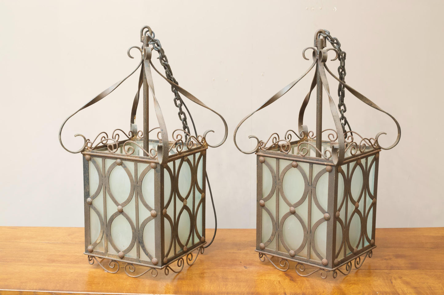 Pair of early 20th century Iron and frosted glass hanging lanterns