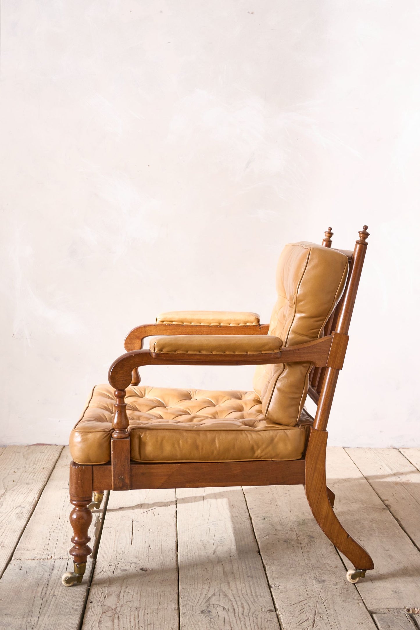 Victorian mahogany and leather spindle back library chair