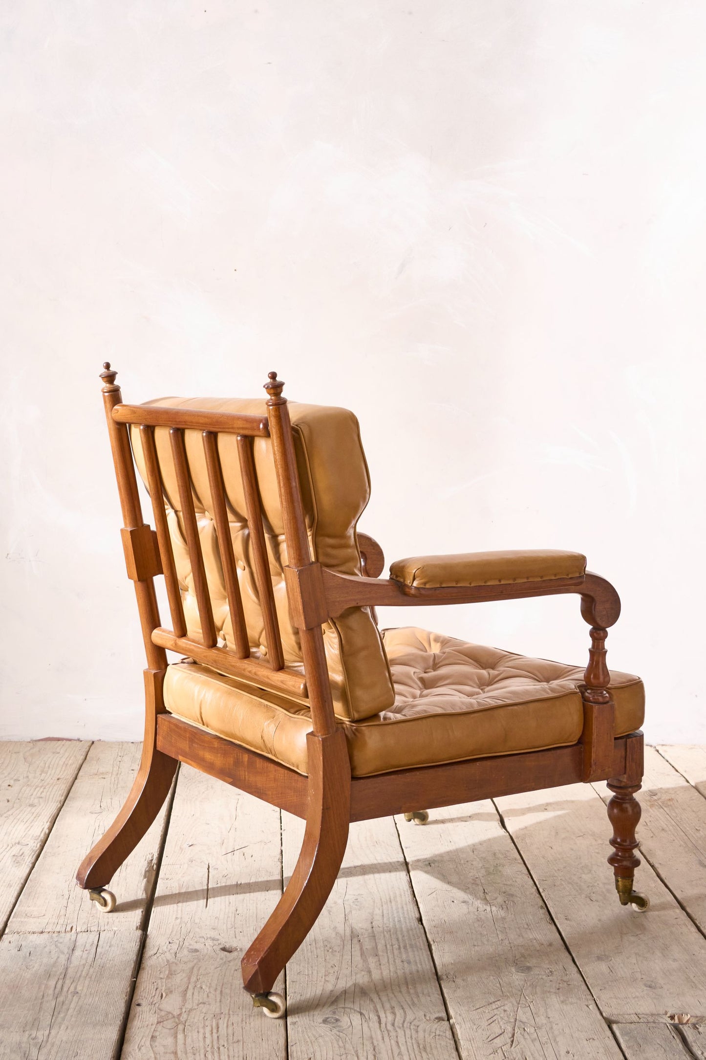 Victorian mahogany and leather spindle back library chair