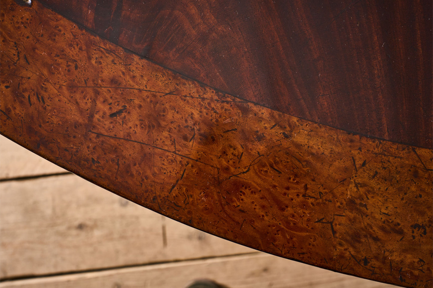 Regency period Flame mahogany and maple centre table.