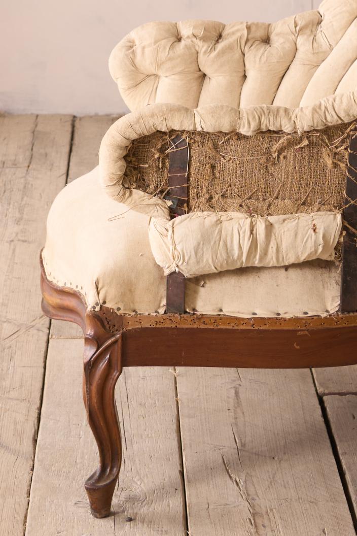 19th century French buttoned iron back armchair