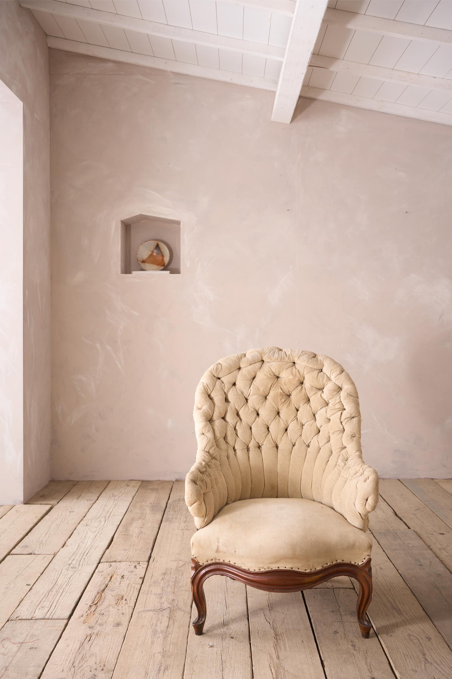 19th century French buttoned iron back armchair