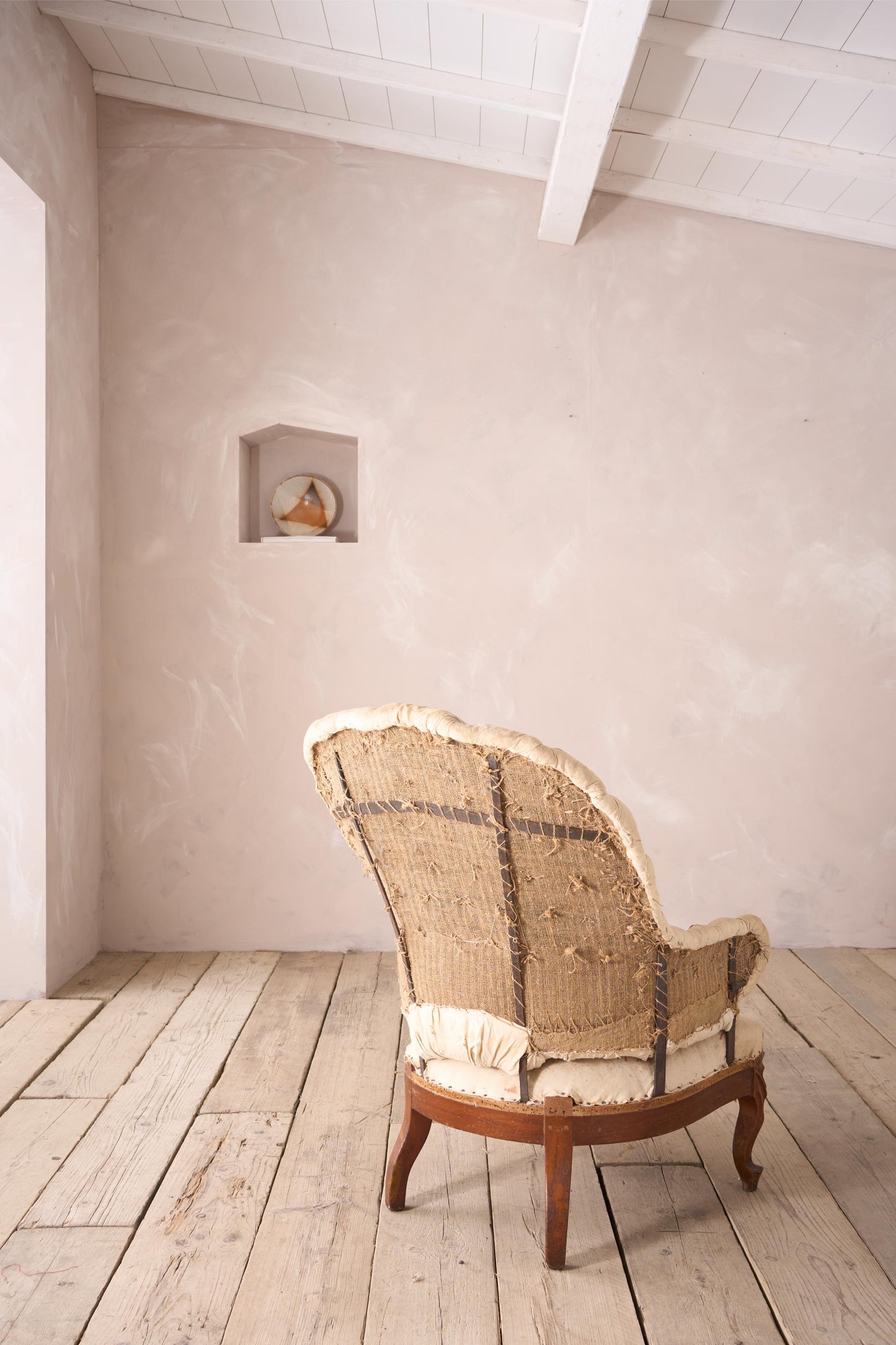 19th century French buttoned iron back armchair