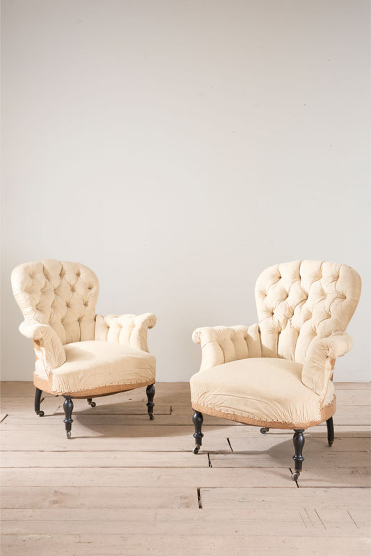 Pair of Napoleon III buttoned spoon back armchairs