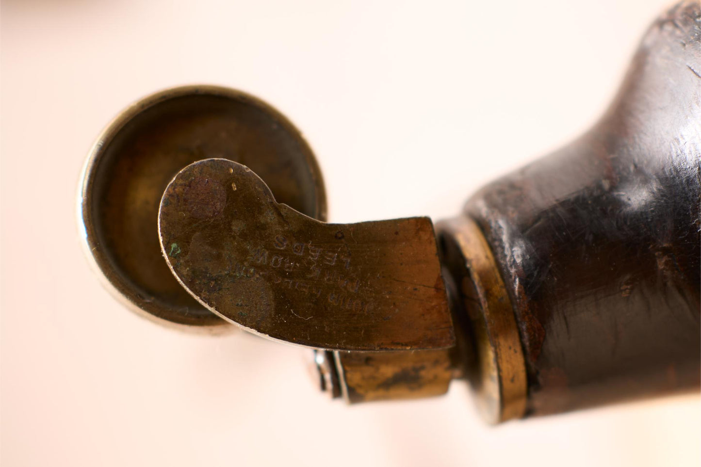 Victorian stretchered wingback armchair by John Reid & Sons