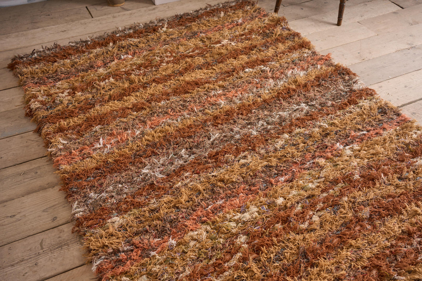 British made Selvedge rug - orange and browns