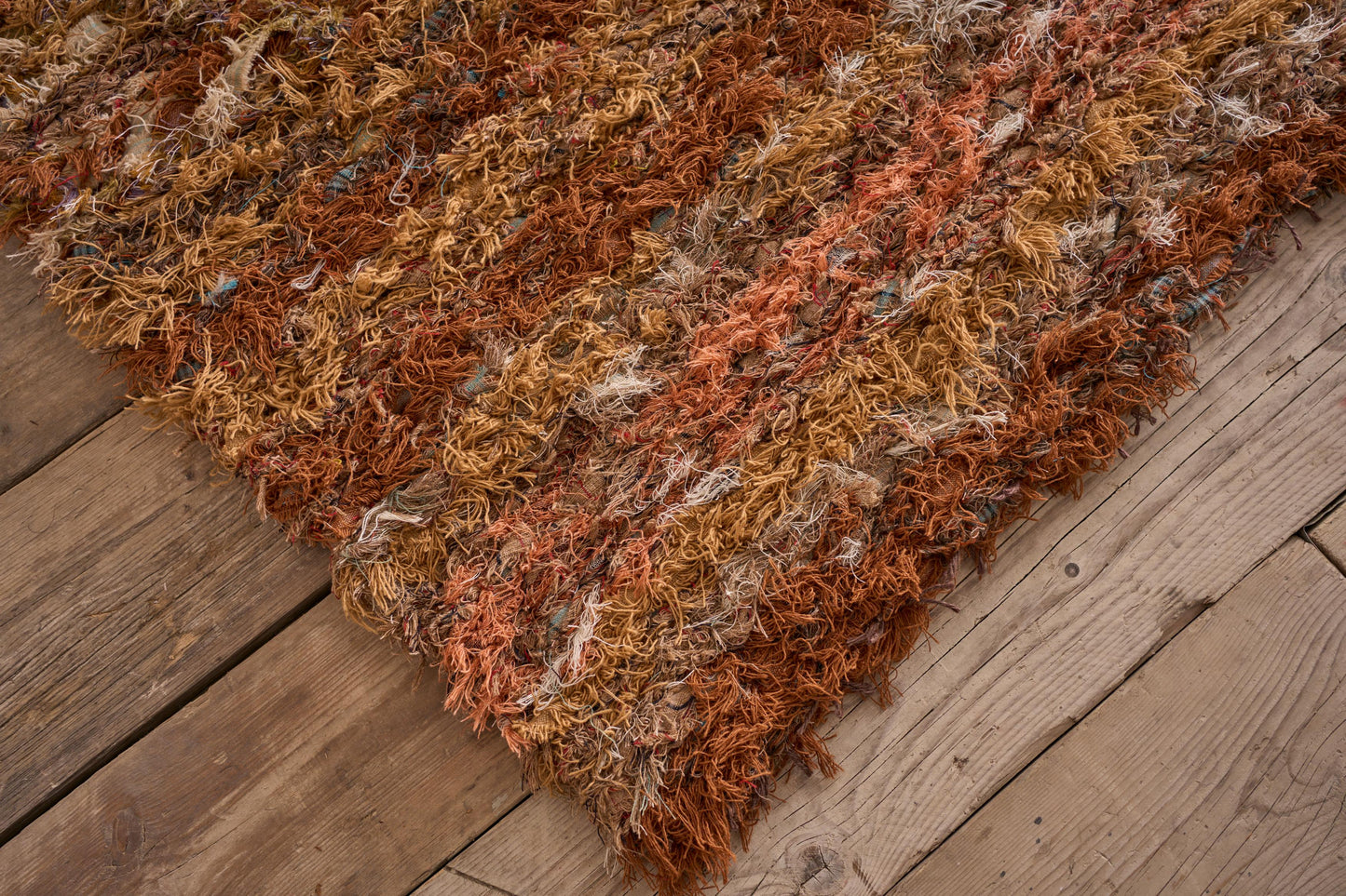 British made Selvedge rug - orange and browns