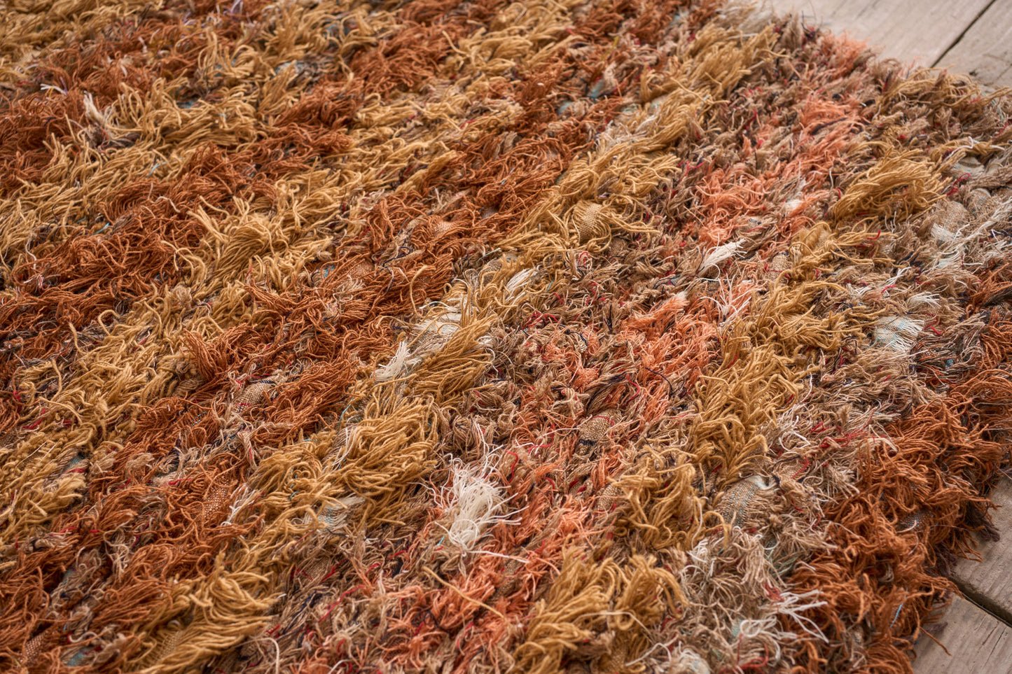 British made Selvedge rug - orange and browns