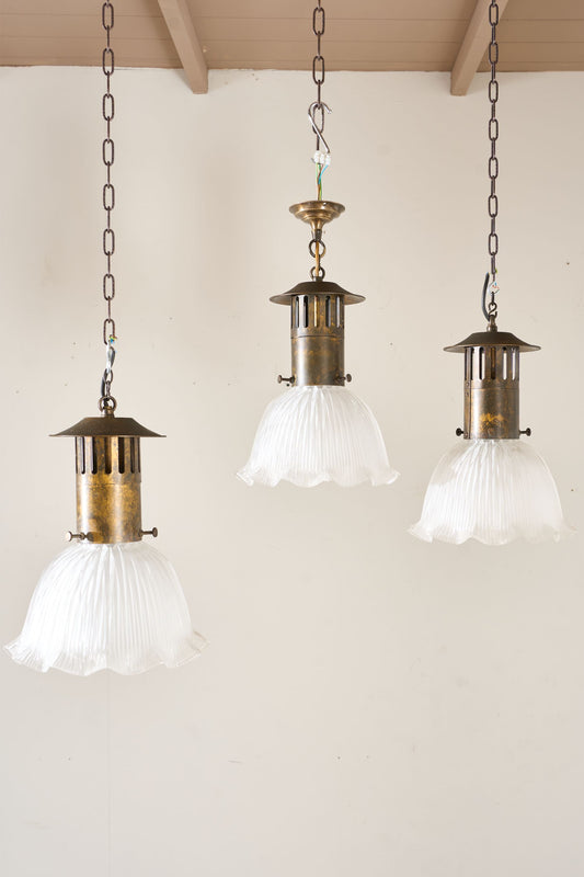Trio of 20th century Holophane pendant lights