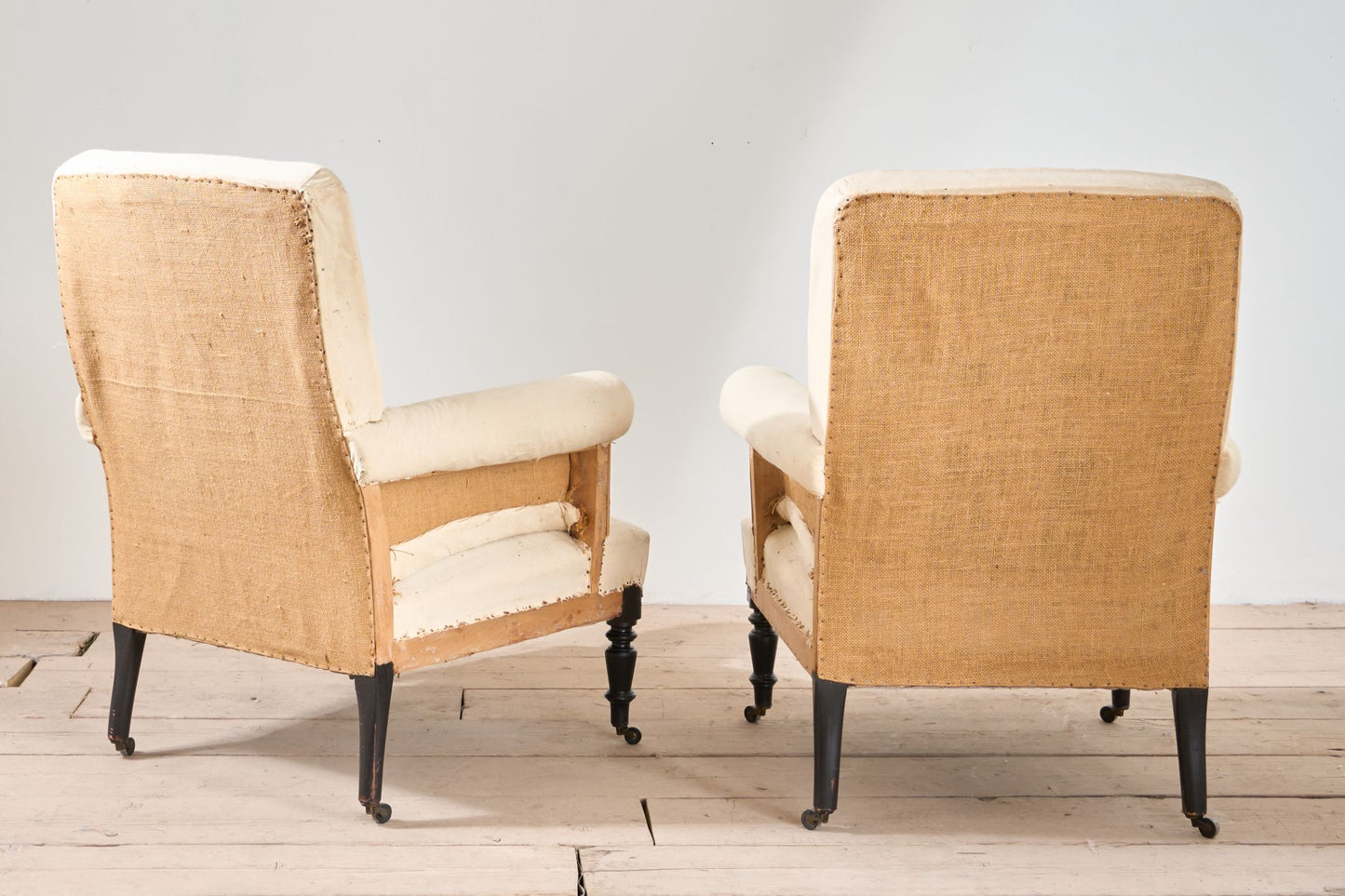 Pair of Napoleon III square back armchairs on tall legs