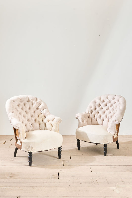 Pair of Napoleon III buttoned tub chairs