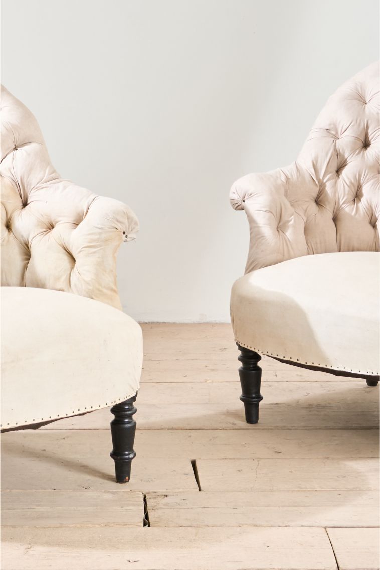 Pair of Napoleon III buttoned tub chairs