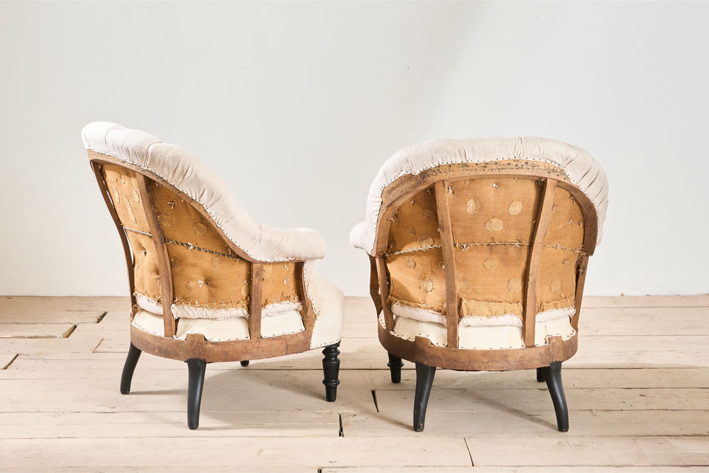 Pair of Napoleon III buttoned tub chairs