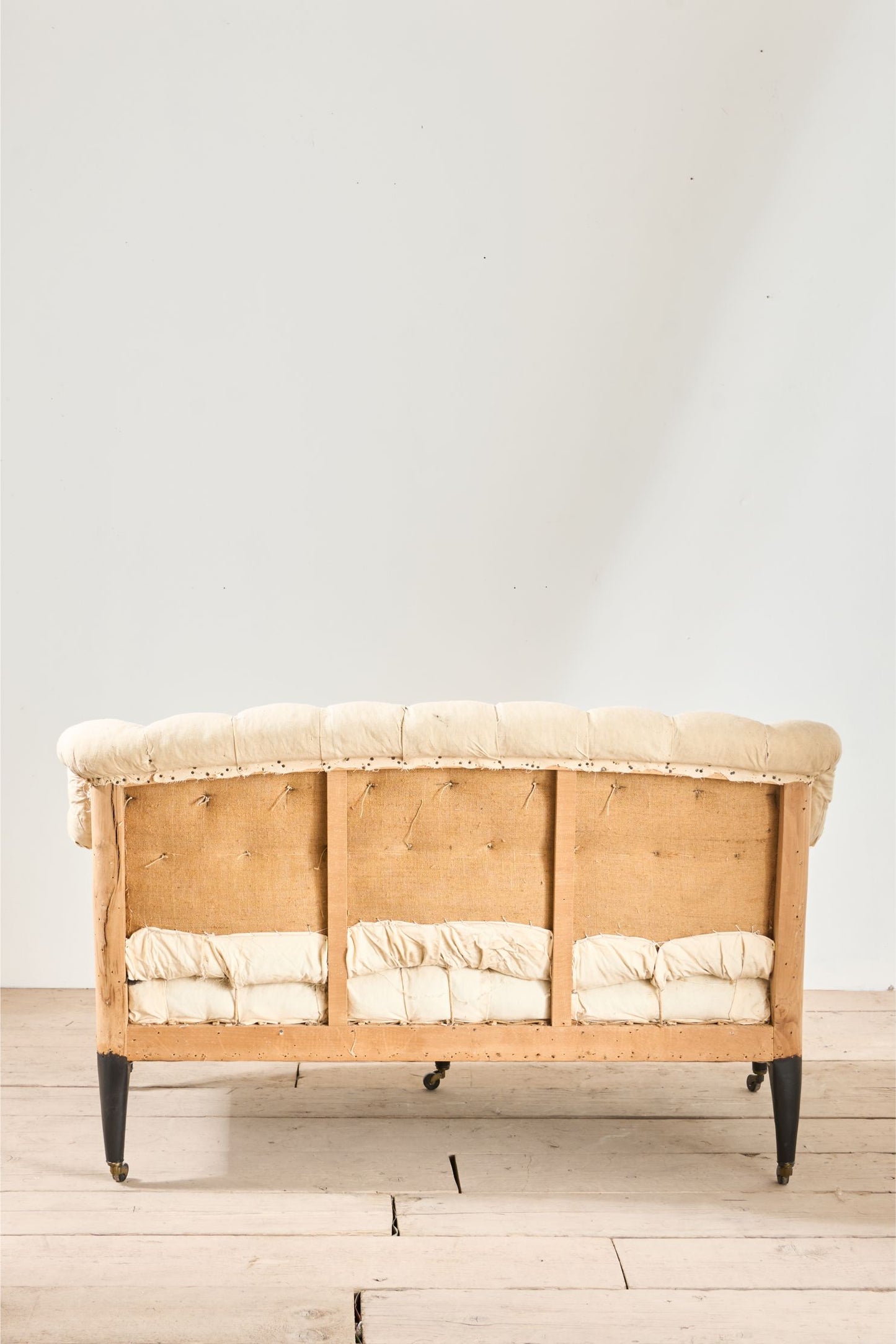 Napoleon III buttoned back and seat sofa with cabriole legs