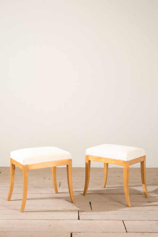 Early 20th century pair of Swedish satin birch stools