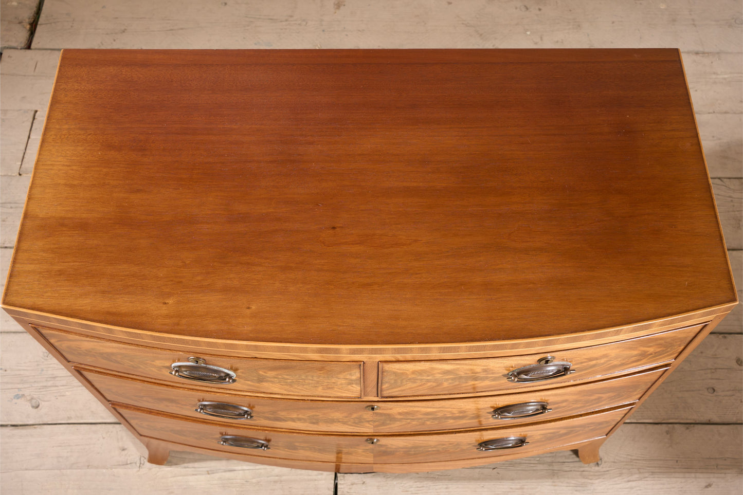 Early 20th century Bow fronted mahogany chest of drawers