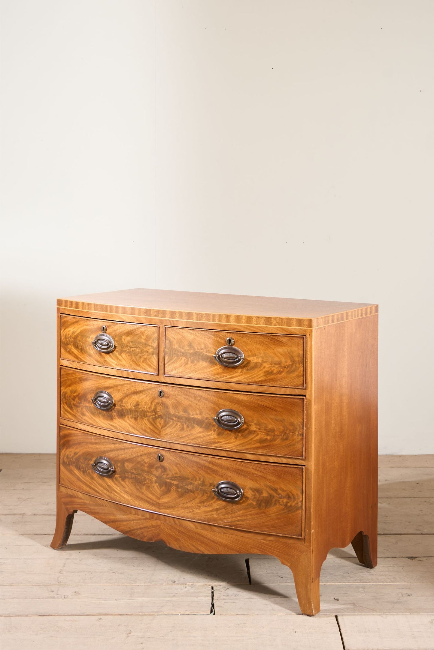 Early 20th century Bow fronted mahogany chest of drawers