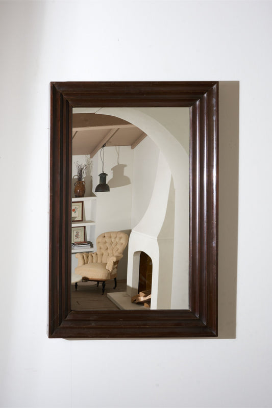 Unusual 20th century African hardwood moulded mirror