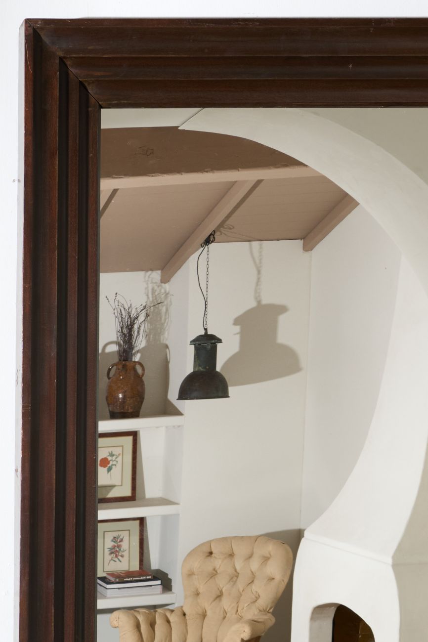 Unusual 20th century African hardwood moulded mirror