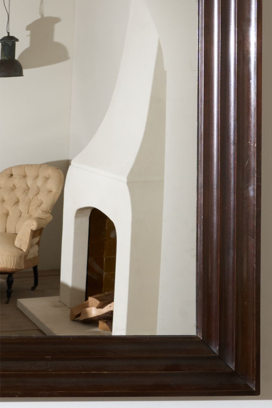 Unusual 20th century African hardwood moulded mirror