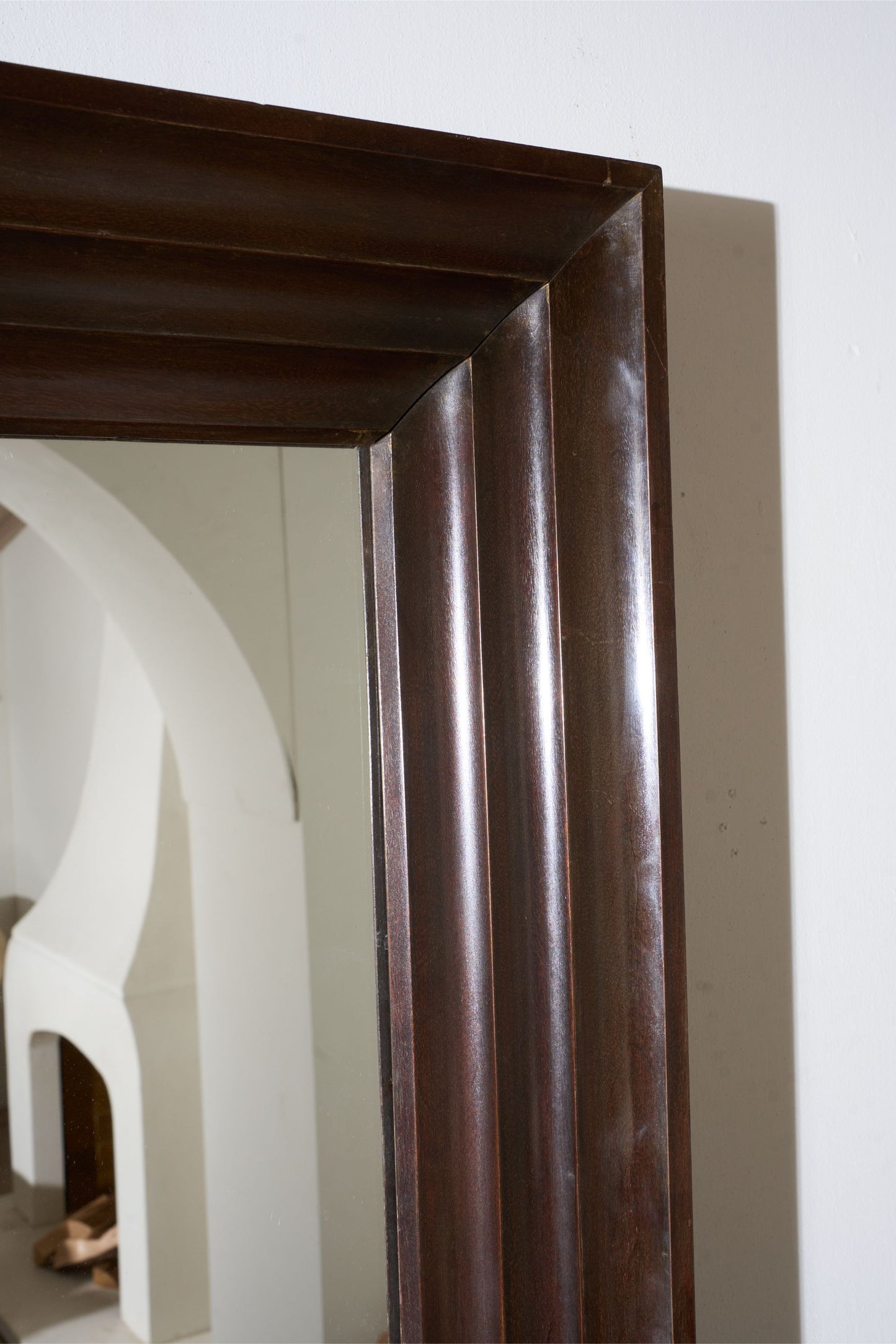 Unusual 20th century African hardwood moulded mirror